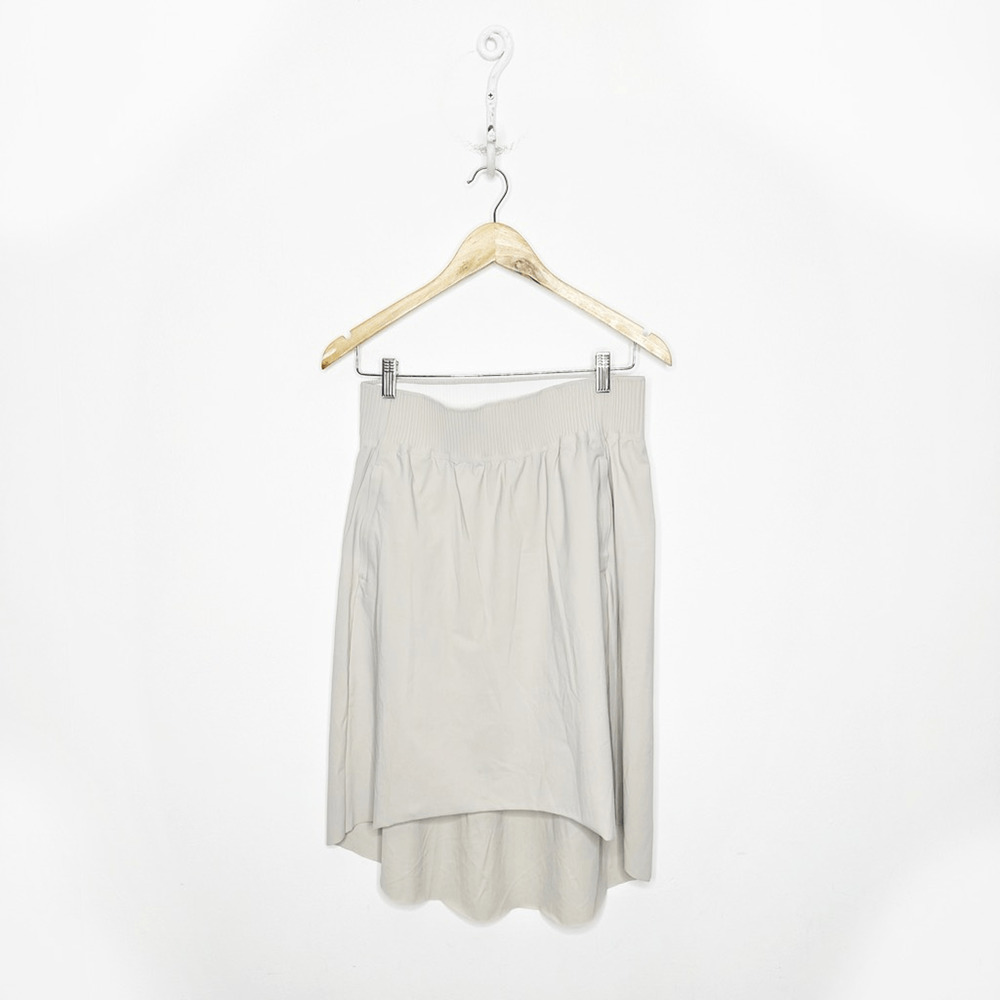 ATHLETA COSMIC SKIRT Beige elastic pull on travel high low #566667 womens small